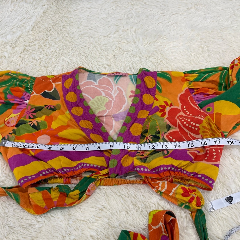 Vibrant Patchwork Blouse With Floral Accents - image 4